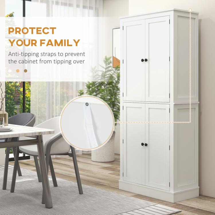 White pantry cabinet with anti-tip strap detail, standing cabinet with doors closed