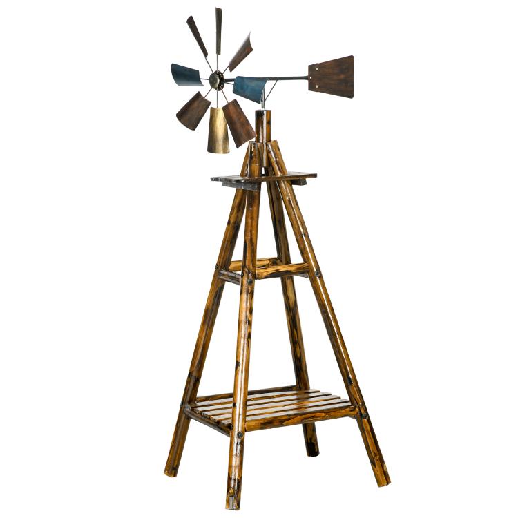 Windmill weather vane with stained wood legs, blue blades, and circular hub