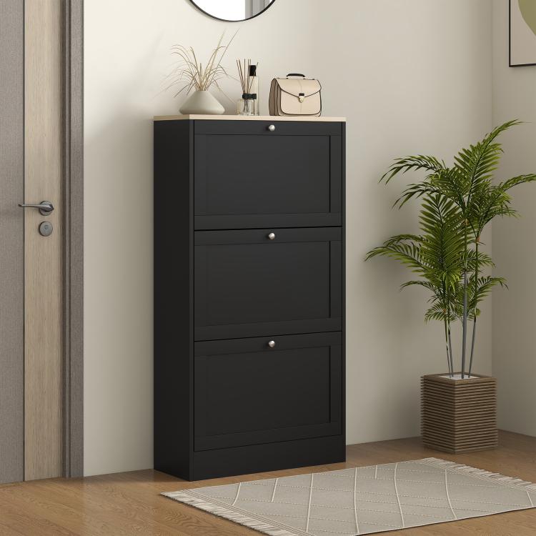 Black shoe storage cabinet with three drawer-style fronts and a flip top shelf