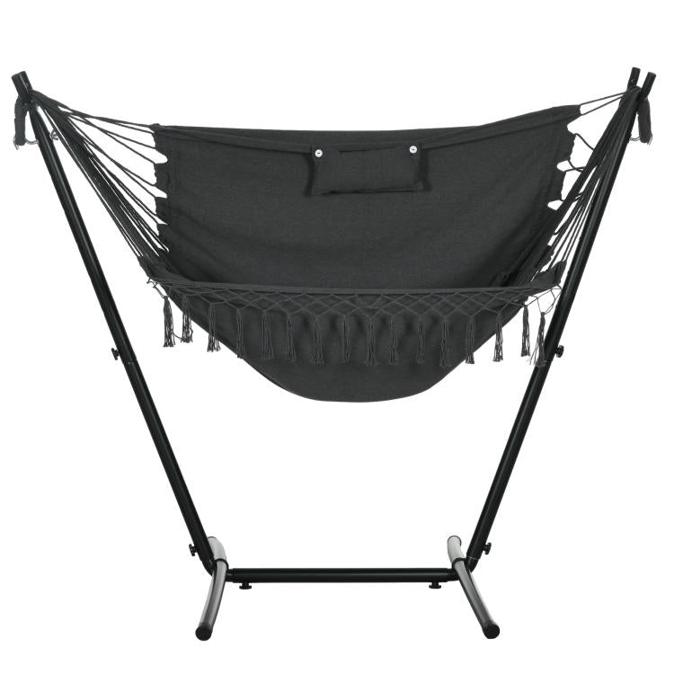 Dark gray hammock chair with headrest pillow and fringe, supported by U-shaped stand