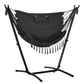 Dark gray hammock chair with U-shaped stand and headrest, fringed hammock swing