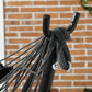 Dark gray hammock chair rope attachment on black stand post