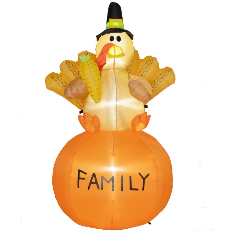 Inflatable turkey decoration in orange with pilgrim outfit and “FAMILY” on front.