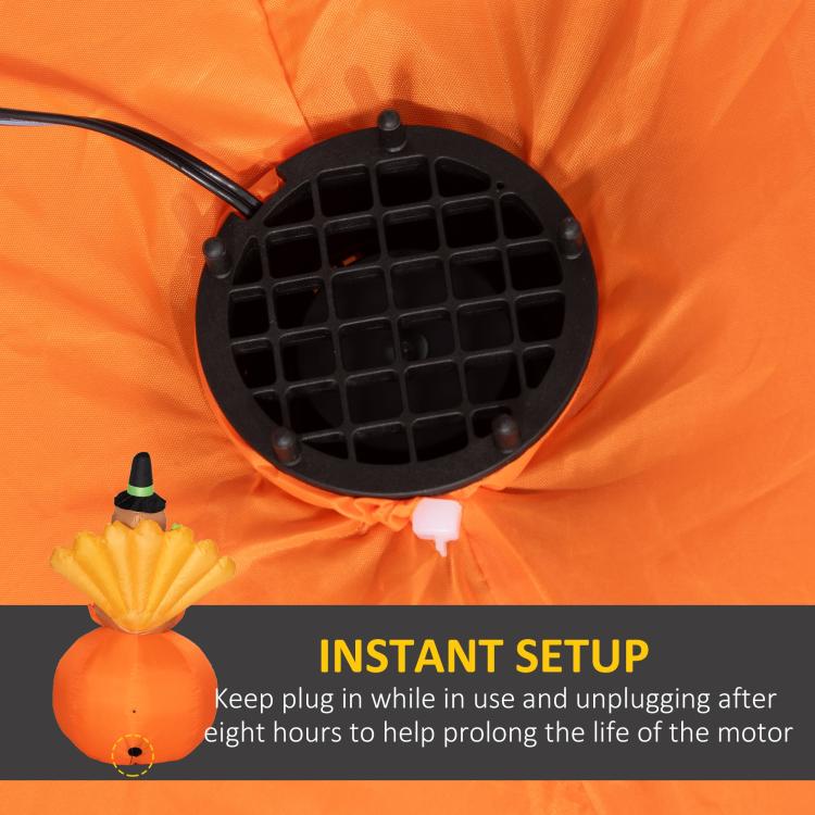 Close-up of LED fan area on orange inflatable turkey with power cable.