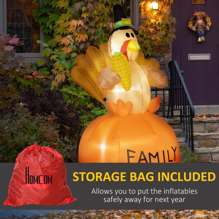 Orange inflatable turkey with pilgrim hat, glowing LEDs, and “FAMILY” on belly.