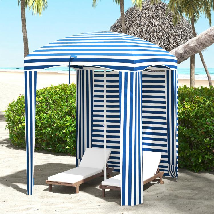 Blue-and-white striped beach cabana umbrella with open walls and interior seating