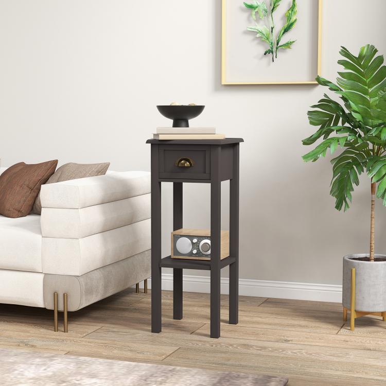 Charcoal end table with drawer and open tiers holding decor and books