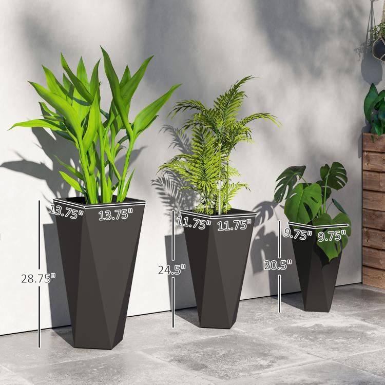Tall black stackable planters shown with size markings and multiple plant types