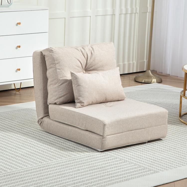 Beige folding floor sofa with two seat-back pillows on a rug