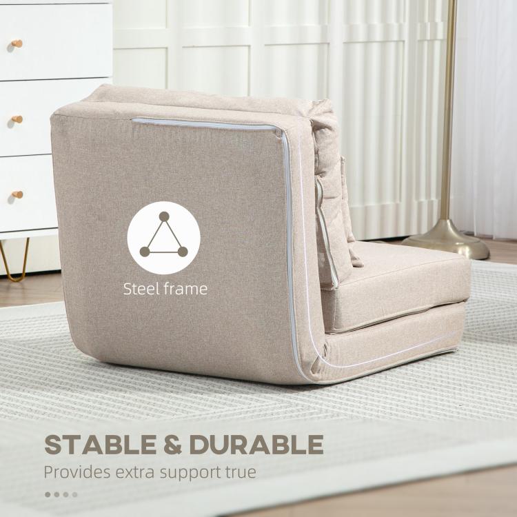 Beige folding sofa bed in compact folded position with side arm panel