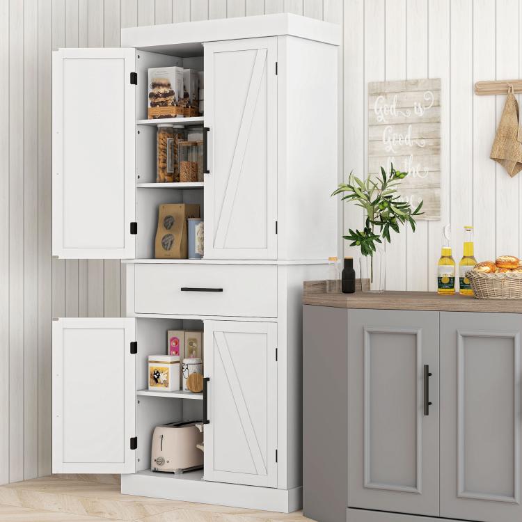 White kitchen cabinet pantry unit with barn doors, shelves, and drawer below