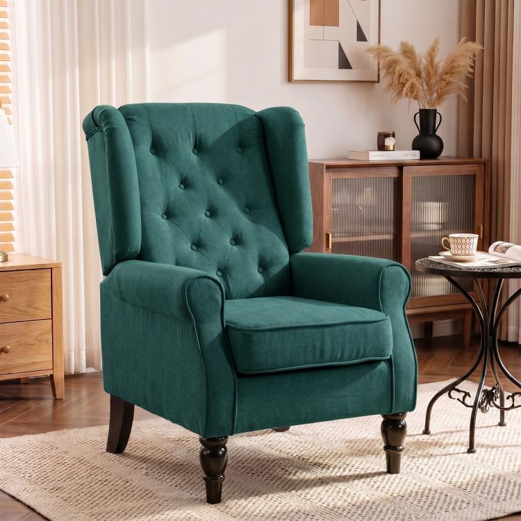 Dark green lounge accent chair with wingback design, button-tufted back, turned wood legs