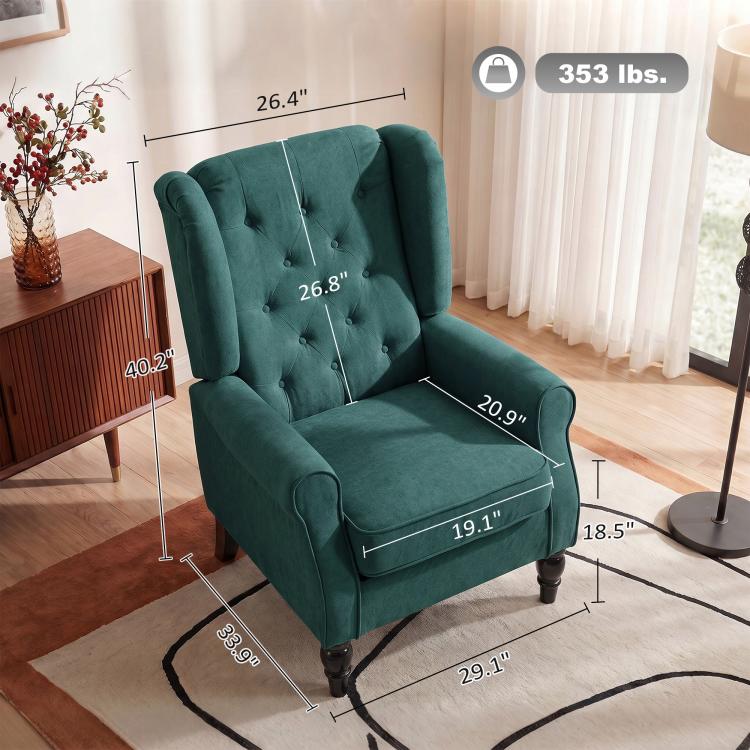 Dark green upholstered lounge chair with wingback sides, button-tufting, and turned legs