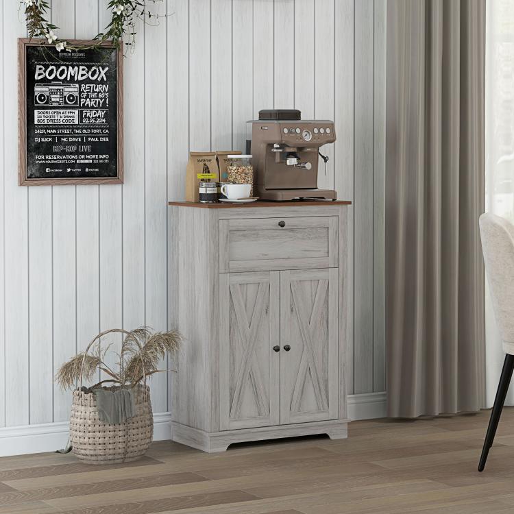 Light gray sideboard cabinet with drawer and double doors, used as coffee bar