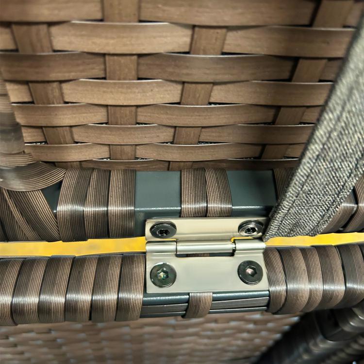 Wicker storage bench latch and hinge hardware detail