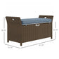 Outdoor wicker storage bench with dark blue cushion, size diagram view.