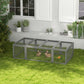 Gray rabbit hutch with wire-mesh sides, two rabbits inside, enclosed outdoor run