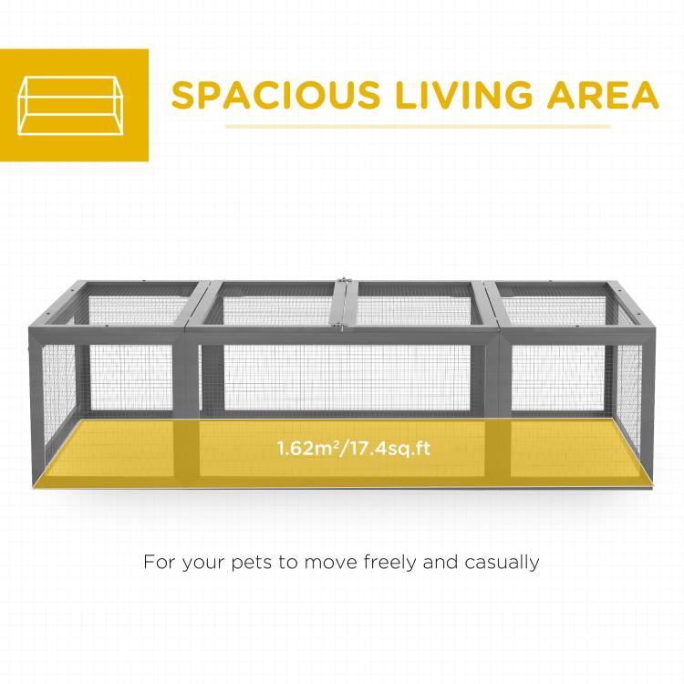 Gray rabbit hutch with wire-mesh panels and yellow base tray for enclosed area