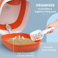 Open dome cat litter box with lid, white and orange, scoop showing inside litter