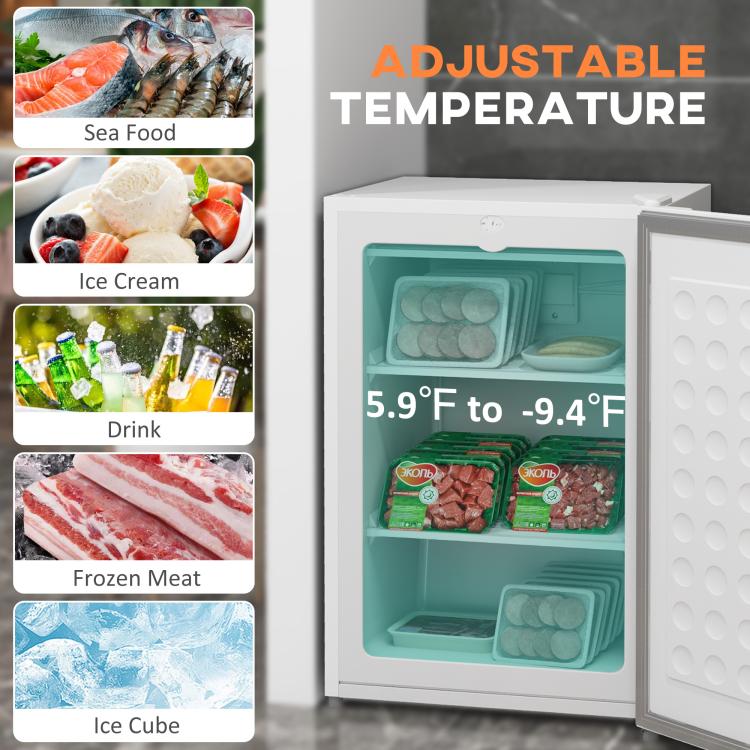 White upright freezer with open door showing teal interior and packaged frozen foods