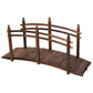 Wood garden bridge with arched side railings and dark stained deck