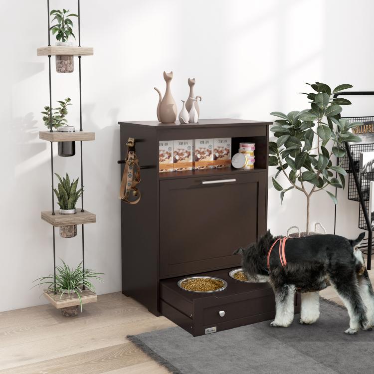 Gray pet feeder cabinet with open compartment and raised bowls, in a home setting