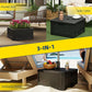 Black 3-in-1 outdoor umbrella stand with planter box and side table design, on patio