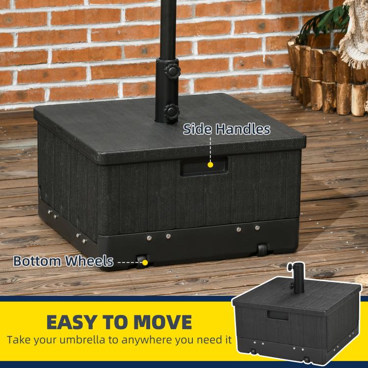 Black umbrella base with side handles and bottom wheels on wooden patio boards