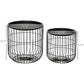 Nesting coffee table set in black with two round wire baskets and dark circular tops