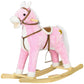 Pink plush rocking horse ride-on with curved wooden rockers and brown leather-style harness