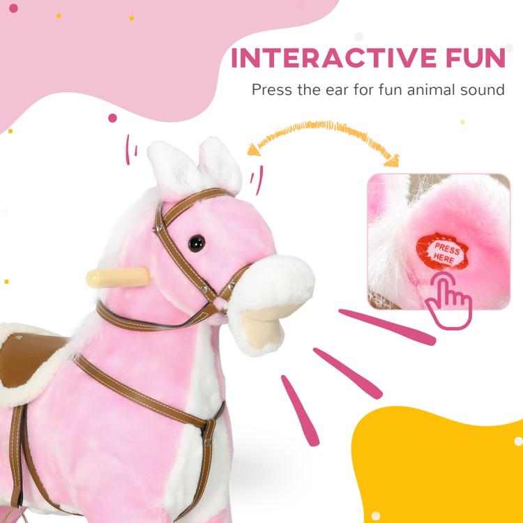 Pink plush rocking horse with sound ear feature and brown bridle on wooden rockers
