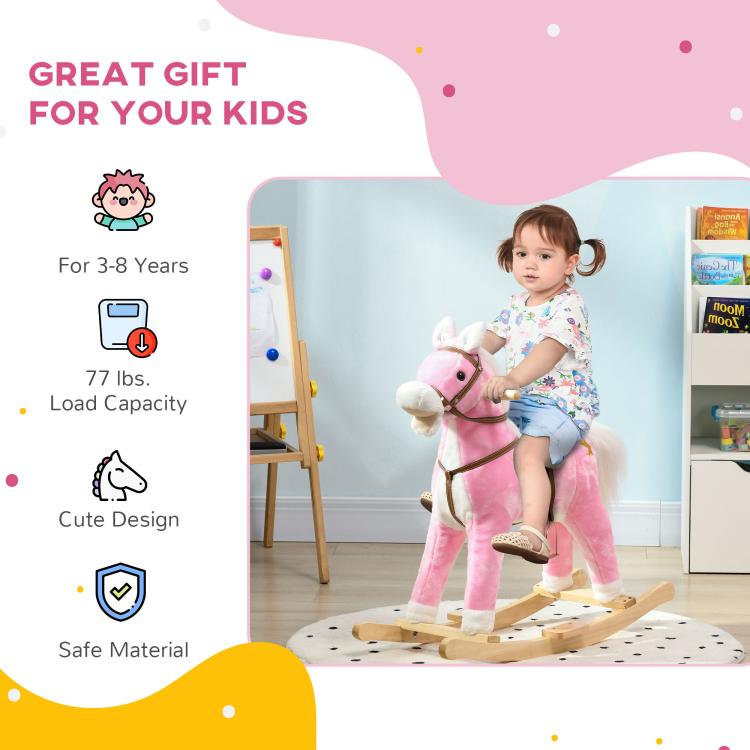 Pink plush rocking horse ride-on for toddlers with wooden rocker base and star on side
