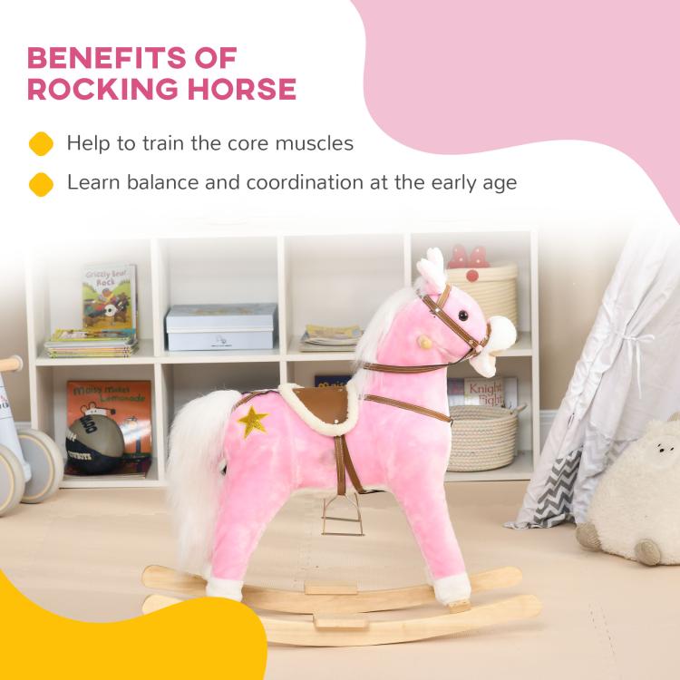 Pink plush rocking horse ride-on with wooden rocker base and brown harness saddle