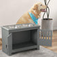 Gray dog feeding cabinet with two stainless steel bowls and open storage compartment