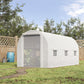 White walk-in tunnel greenhouse with roll-up door and multiple window openings