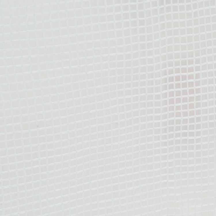 Close-up of white greenhouse mesh fabric with grid texture