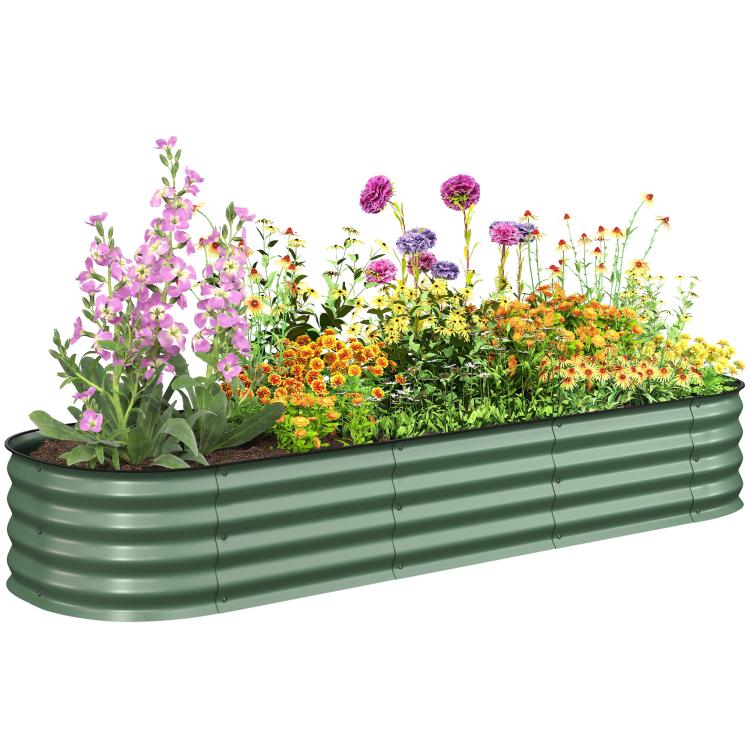 Green metal raised garden bed planter with safety edging, filled with colorful flowers