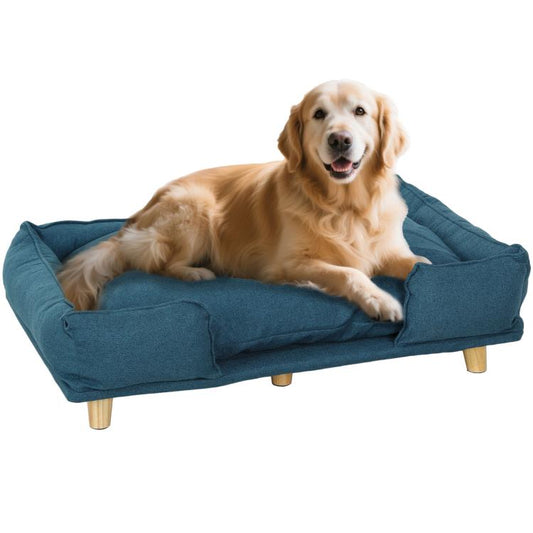 Dark blue raised dog couch bed with cushioned base and four wooden legs