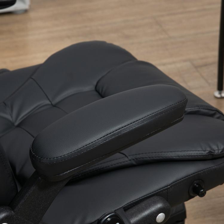 Close-up of black padded massage chair seat and arm control lever