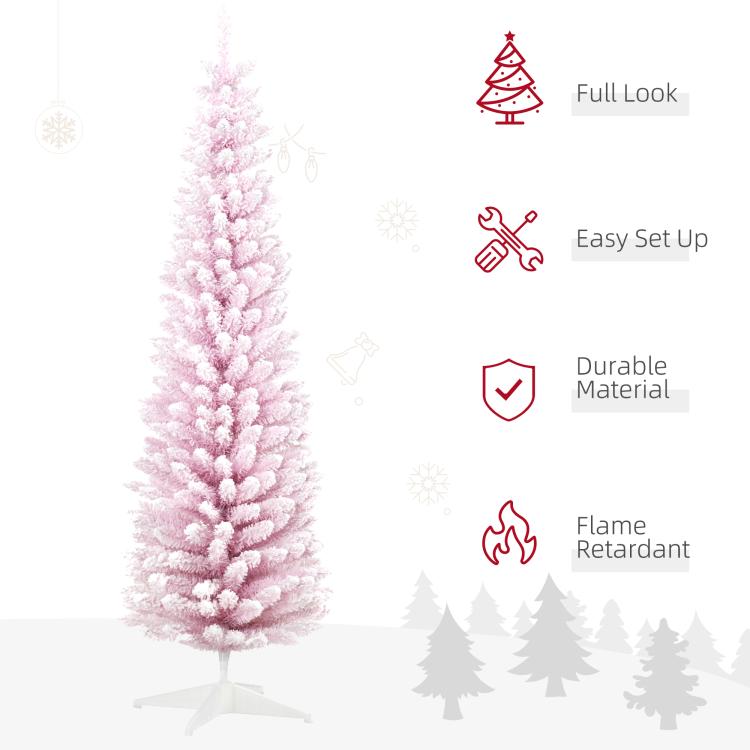Pink snow-flocked pencil Christmas tree with full, layered branches on a white stand