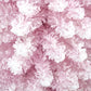 Close-up of pink snow-flocked artificial tree branches with white coating