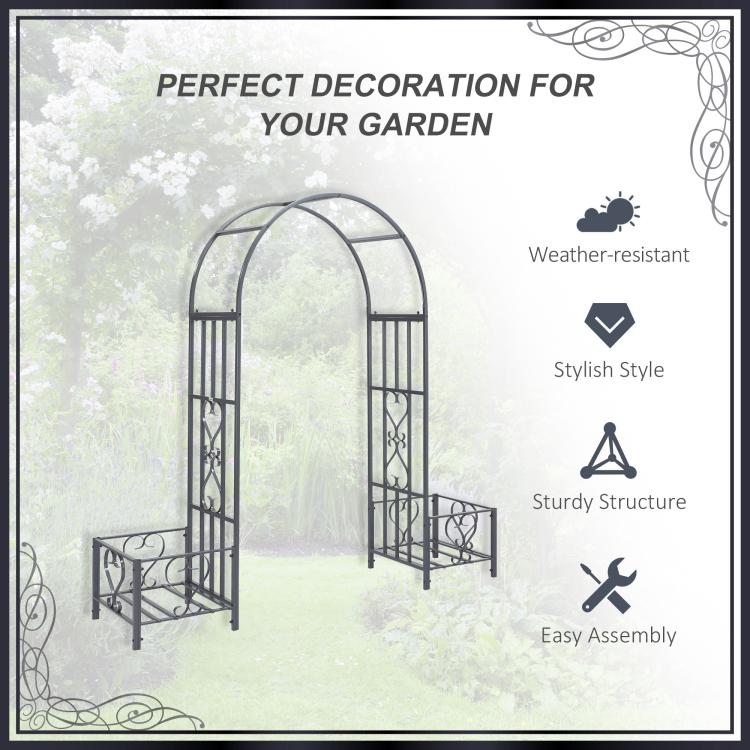 Dark gray steel garden arch arbor featuring scrollwork hearts on side panels