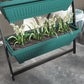 Green 4-tier vertical raised planter on black stand with soil and flowers