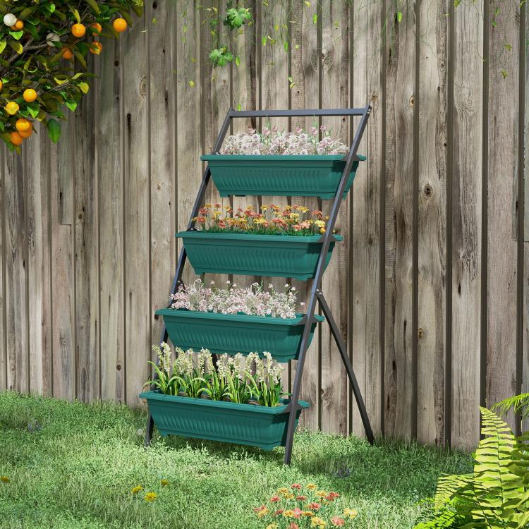 Green 4-tier raised garden planter on black stand with assorted blooming plants