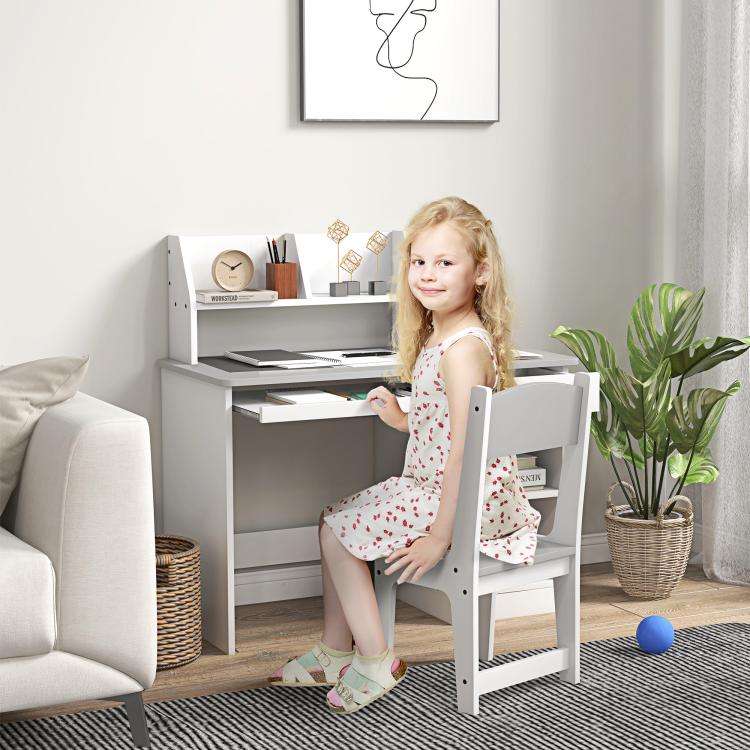 Kids study desk and chair set with child using white desk with open storage shelves