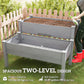 Gray two-tier raised garden bed planter with open top compartments and soil