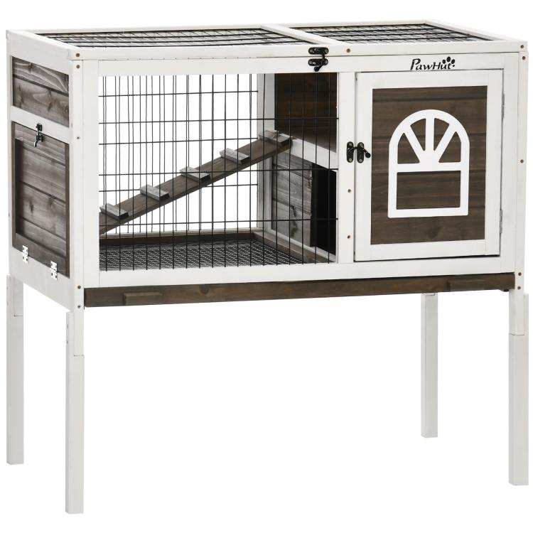 Elevated rabbit hutch with wire enclosure, front door panel, and dark ramp inside