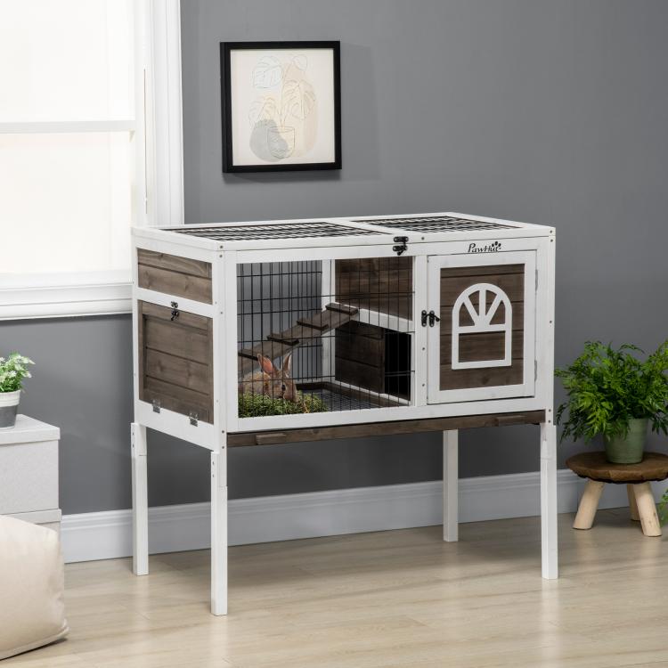 Elevated rabbit hutch with wire run and front door panel; coffee wood side panels