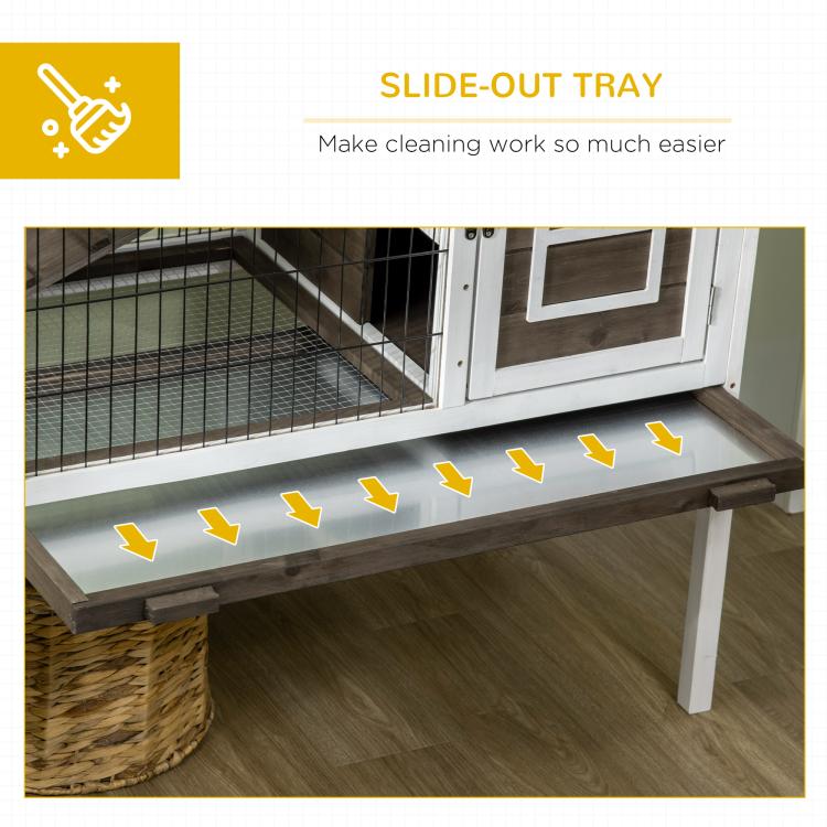Elevated rabbit hutch with slide-out base tray under the wire enclosure
