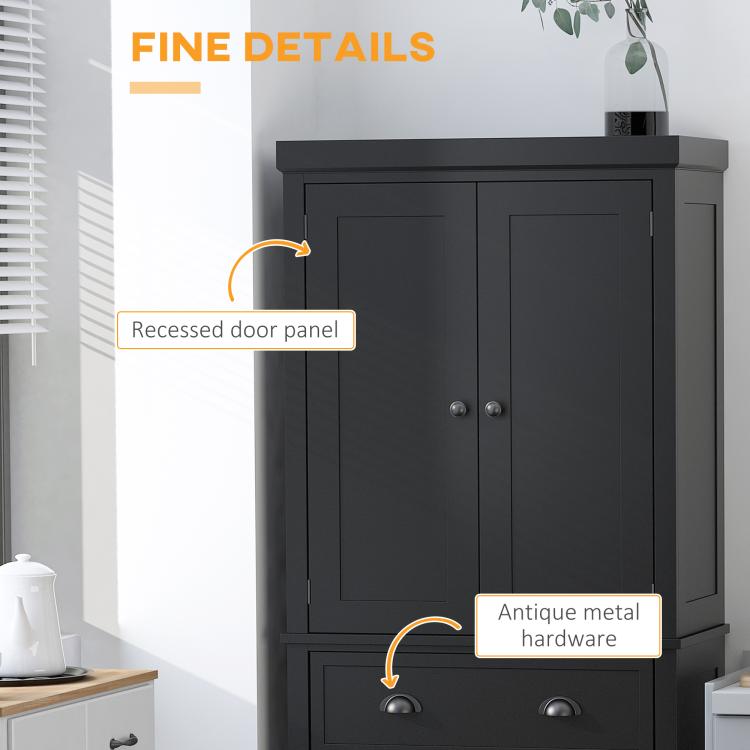 Black pantry cabinet with recessed door panels and antique metal hardware